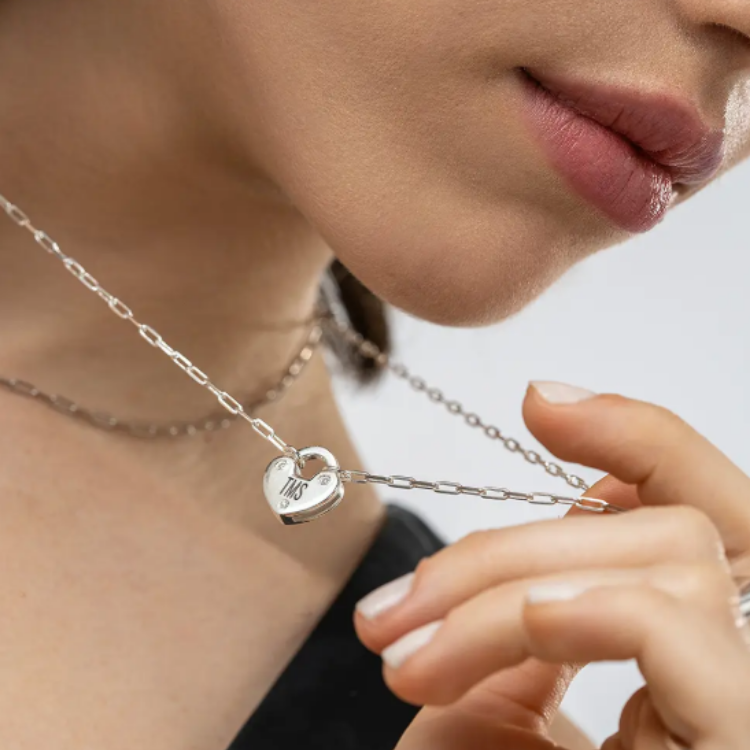 Semi-fine jewelry — sterling silver heart charm lock necklace with diamonds