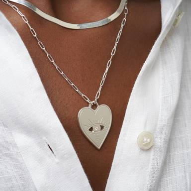 Beautiful white protective eye heart necklace main image 1
