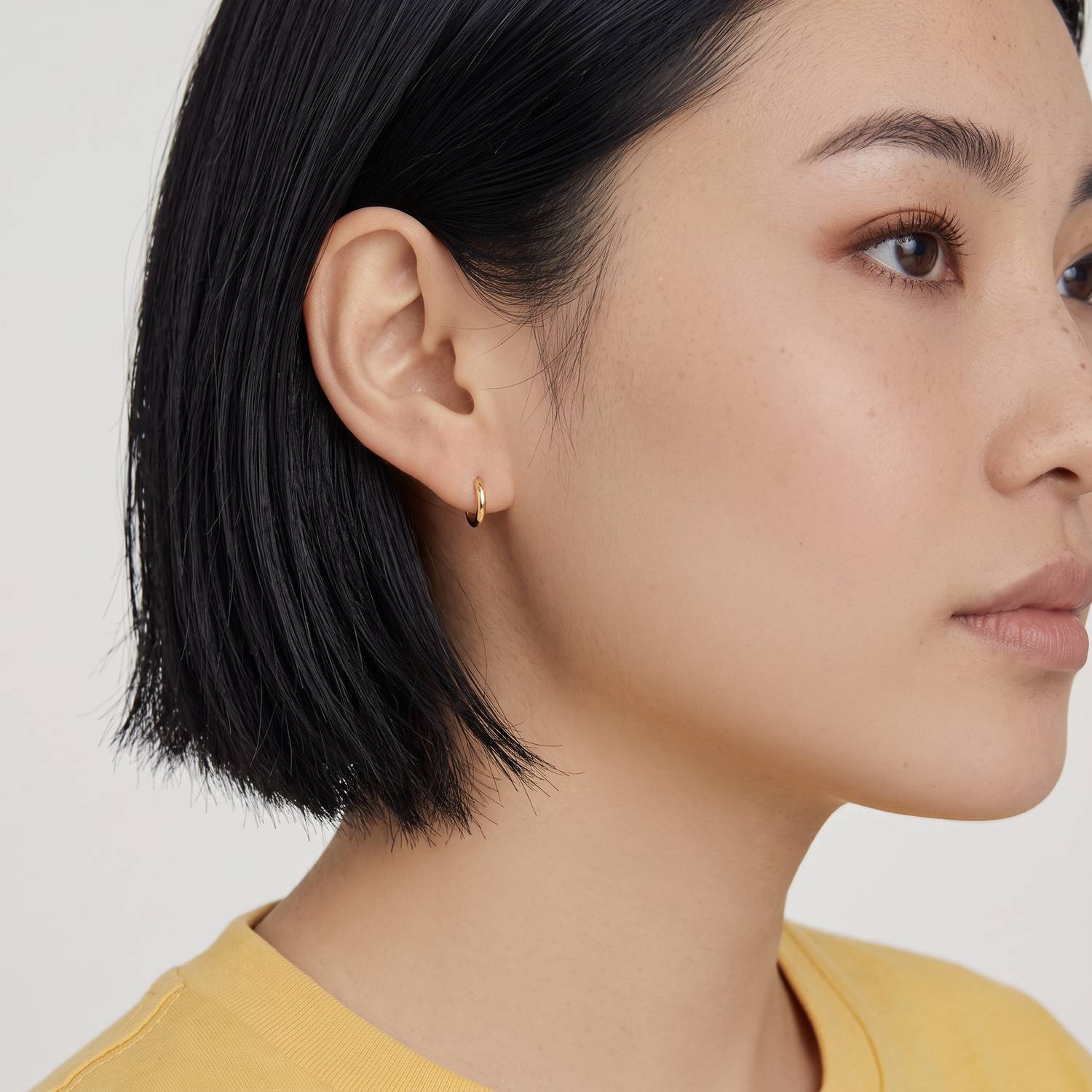 Single mini hoop - 10k Solid Gold-3 product photo